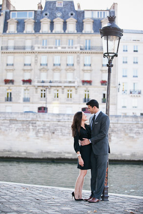 Couple beside Paris lamp