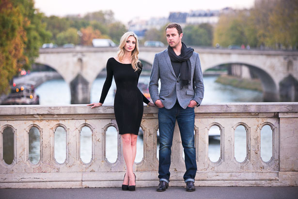Engaged Couple on Bridge Over Seine in Paris