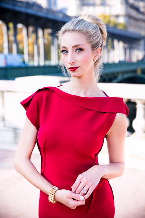 Woman in red dress at Paris Bridge