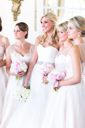 Bride and bridesmaids with wedding bouquets