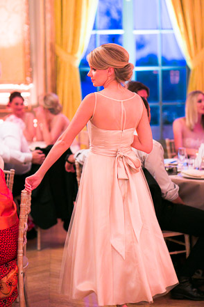 Back of bridesmaid in bowed dress