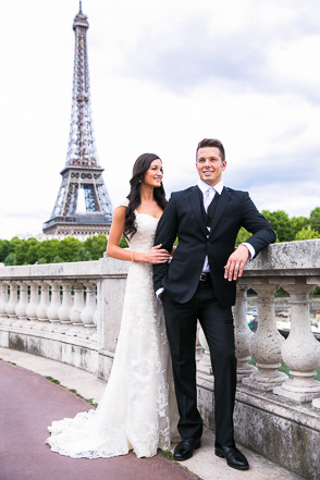 Couple in wedding gown and tux with Eiffel Tower in background