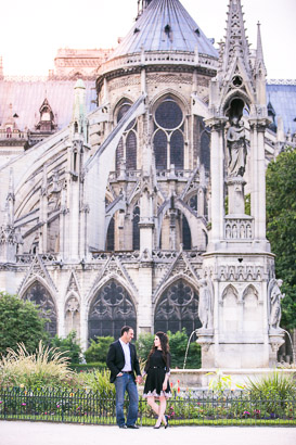 Notre Dame behind engaged couple