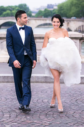 Bride and Groom Crossing Paris Bridge
