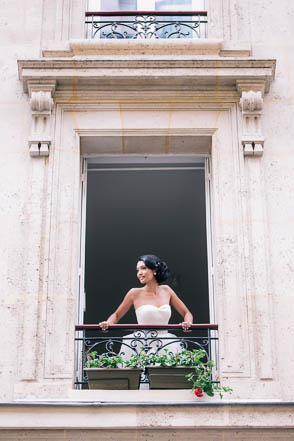 Bride Leaning Out of Paris Apartment Window
