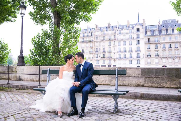 Bride and Groom Sitting on Paris Park Bench