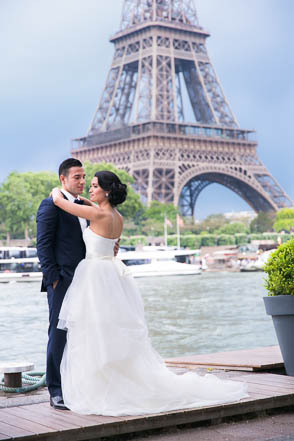 Bride Embracing Groom Beside Eiffel Tower and River Seine