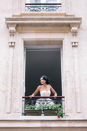 Bride Leans out of Paris Apatrment Window