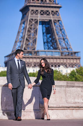 Couple Holding Hands with Eiffel Tower in the Background