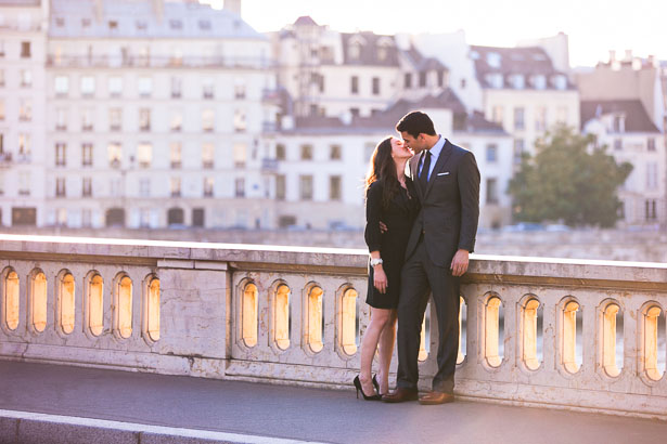 Kissing Couple in Front of Paris Skyline