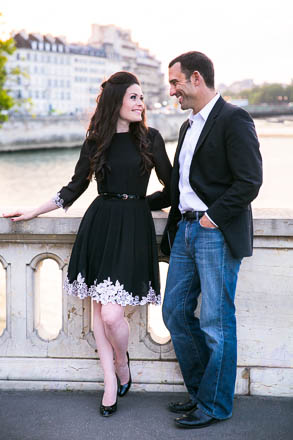 Romantic Couple Smile at Eachother on Bridge in Paris
