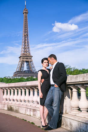 Full Eiffel Tower Behind Engaged Couple