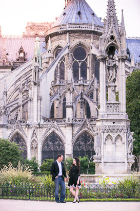 Notre Dame Standing Tall Behind Romantic Couple
