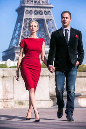 Couple Walking With Eiffel Tower Large in Background