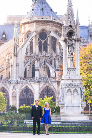Notre Looming Over Engaged Couple
