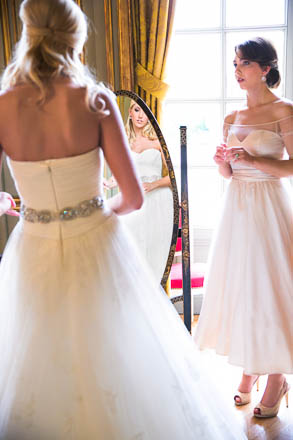 Bride Checking Out Gown in a Cheval Mirror