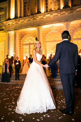 Smiling Bride in Golden Light of Chateau at Night