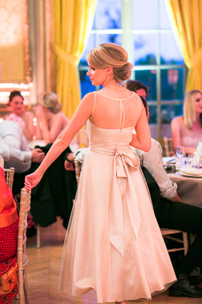 Back of Bowed Bridesmaid Dress at Wedding Reception