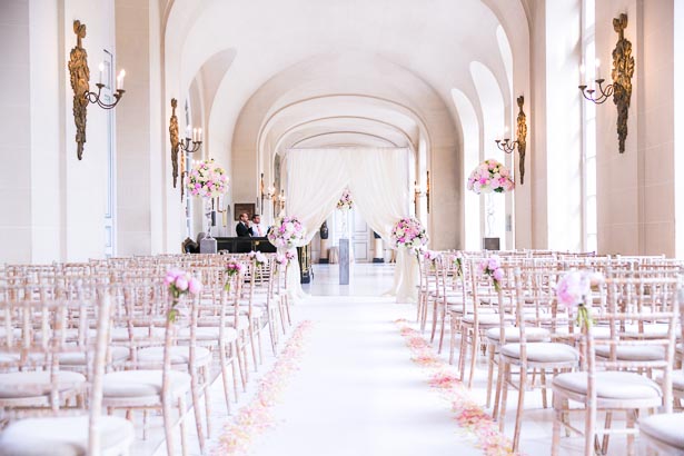 Aisle View of Flowered Wedding Venue Before Guests Arrive