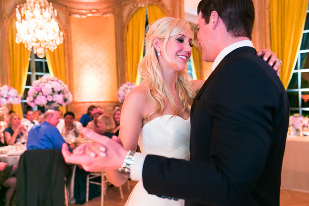 Smiling Bride and Groom During First Dance of a Wedding Reception
