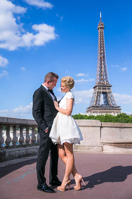 Groom Holding Bride with Eiffel Tower in Background