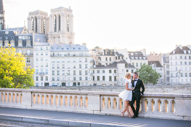 Paris Skyline Behind Groom and Bride